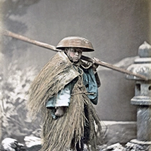 Peasant in grass coat, snow scene, Japan, circa 1880s