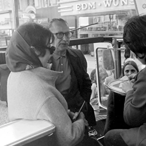 People on a bus, West Berlin, Germany