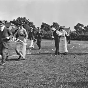 People at a comic sports event in a field