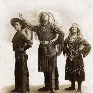 Three people in Cowboy and Indian costume in studio photo