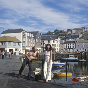 People by the harbour, Mevagissey, Cornwall