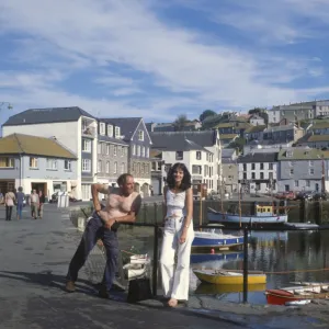 People by the harbour, Mevagissey, Cornwall