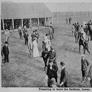 People in the paddock at Lewes racecourse, Sussex