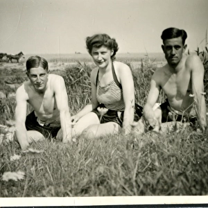 Three people relaxing, Lessingen, Germany, WW2