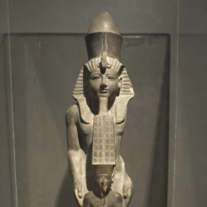 Pharaoh Ramses IV next to god Amun. Egypt