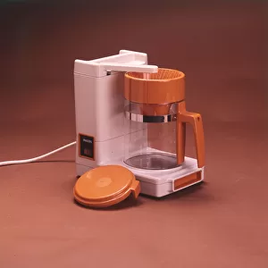 A Philips food blender or liquidiser in a trendy shade of 70s orange