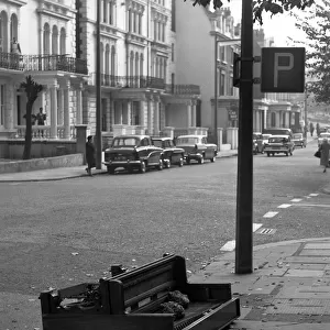 Piano abandoned on a street in Paddington, London