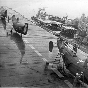 Three Piasecki HRP-1s on the flight deck of the aircraft car