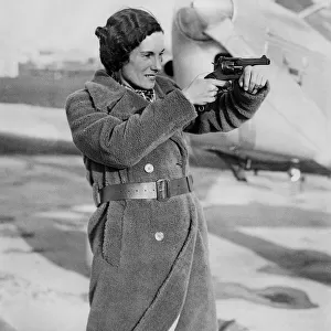 A Picture of Jean Batten with a Hand-Gun