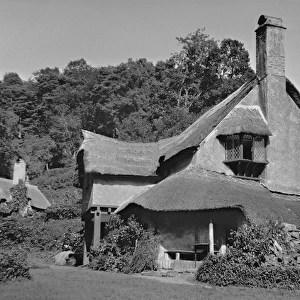 A picturesque house with a thatched roof