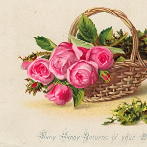 Pink roses in a basket on a birthday card