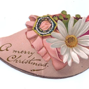 Pink and white flowers in a shoe-shaped Christmas card
