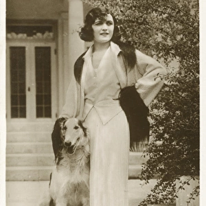 Pola Negri, film and theatre star, with her dog