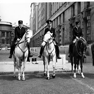 Four police officers on horseback, Central London