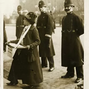 Policemen guarding suffragettes