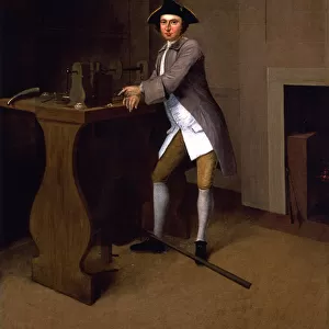 Portrait of a gentleman in an interior, at a lathe