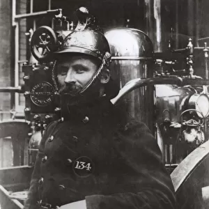 Portrait of a late Victorian MFB fireman with engine