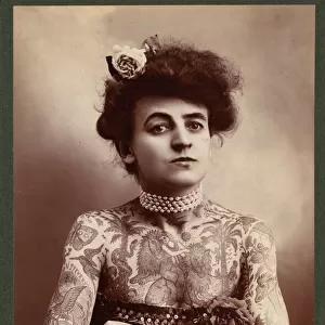 Portrait of a woman showing images tattooed or painted on he