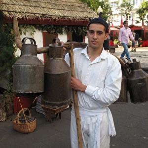 Portugal, Madeira, Funchal: peasant with milk containers