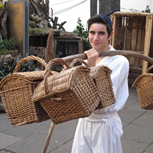 Portugal, Madeira, Funchal: peasant with old type baskets