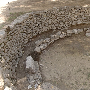 Prehistoric Art. Bronze Age. Stone foundation of an apsidal