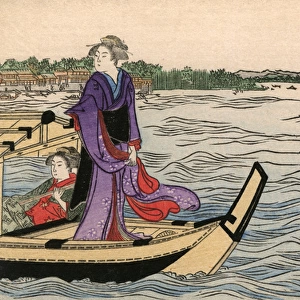 Two pretty Japanese women on a riverboat