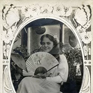 Pretty young girl holding a Stowers promotional fan