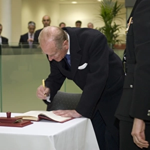 Prince Philip signing a register at the new LFB HQ