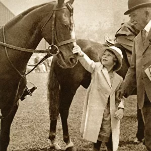 Princess Elizabeth meets a pony at the Richmond Horse Show