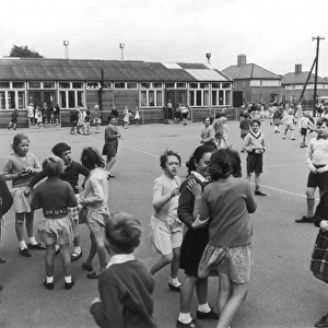 Pupils in playground, St Lukes C of E Primary