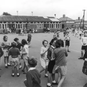 Pupils in playground, St Lukes C of E Primary