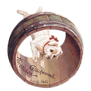 Puppy with barrel on a German Good Luck card