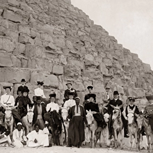 Pyramids at Giza, Egypt, circa 1900 - Tourist group on donke