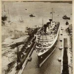 Queen Mary Ocean Liner, entering dry dock at Southampton