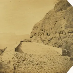 Railway viaduct and retaining walls on rock escarpment