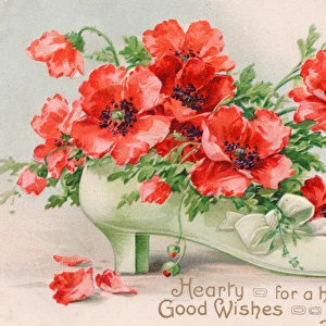 Red poppies in a white shoe on a birthday postcard