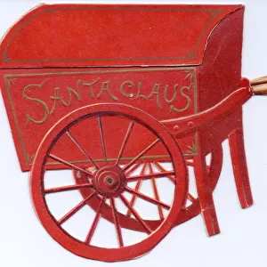 Red wheelbarrow on a cutout Christmas and New Year card