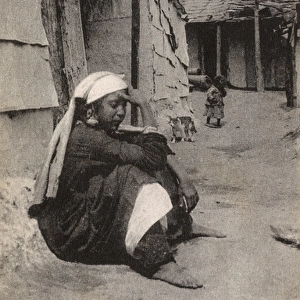 A refugee in Thessaloniki - sitting in the Vardar District