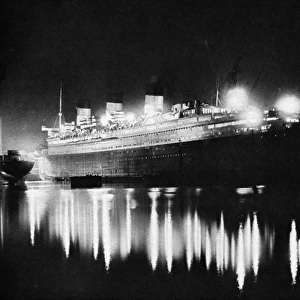 RMS Queen Mary, floodlit at night