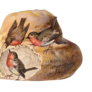 Robins with bread on a loaf-shaped Christmas card