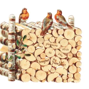 Robins perched on a pile of logs on a cutout New Year card