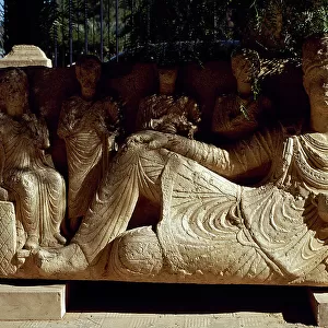 Roman sarcophagus showing the dead reclining on a couch. Arc