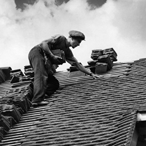 Roof Tiler Lays Slates