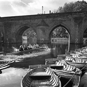 Rowing past hire boats, Durham
