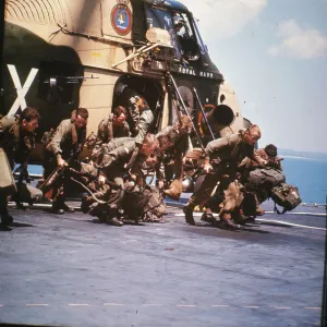 Royal Marine Commandos re-embarking from a Westland Wessex