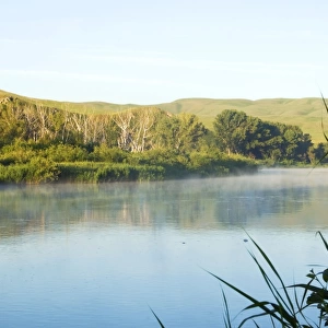 Russia - Morning mist over river Sakmara - a tributary