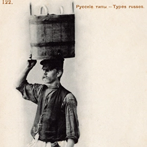Russian porter with a large wooden bucket on his head