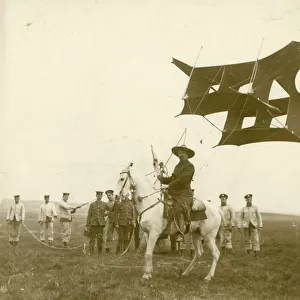 Samuel Cody on horseback with one of his man-lifting kite
