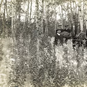 Saskatchewan, Canada - four men with buggy