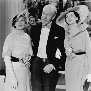 A scene from Rendezvous with Rosalind Russell on the right